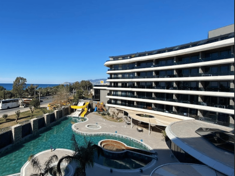 Современная квартира в жилом комплексе премиум класса в 100 метрах от моря, район Каргыджак (010500) — фото 1